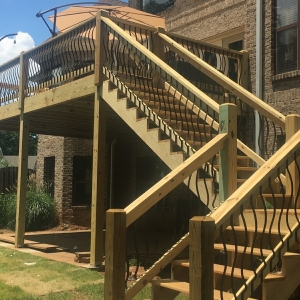 Two Story Wood Deck with Iron Balusters