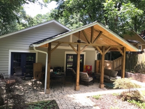 Back Stone Patio with Timber Beam Construction 