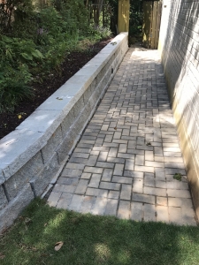 Patterned Set Brick Patio Walkway with Retaining Wall