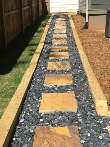 Stepping Stone set in Gravel and Timber Boarder