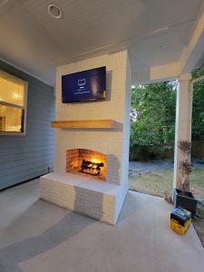Covered Porch Fireplace and Entertainment System 