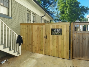 Backyard Privacy Fence with Iron View Accent